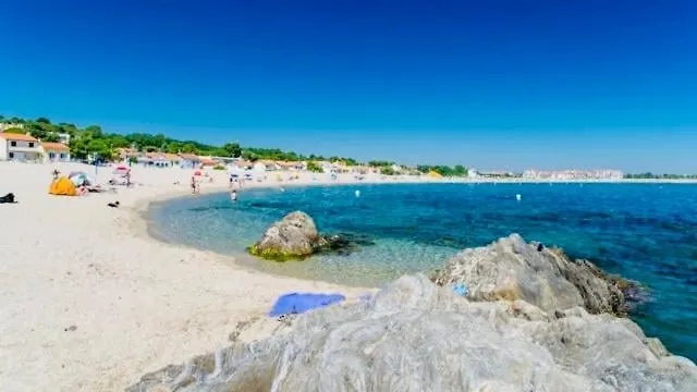 Les pieds dans le sable